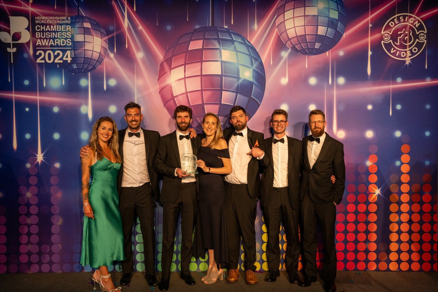 Collecting the award with the team